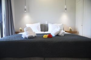 Кровать или кровати в номере Spyridoula Resort Hotel in Corfu