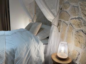 Ένα ή περισσότερα κρεβάτια σε δωμάτιο στο Romantica Spa