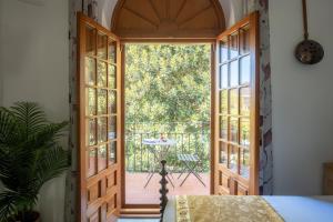 Postel nebo postele na pokoji v ubytování Hommyhome Museo 1925