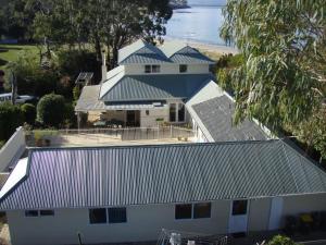 an aerial view of a house with a roof at Bambra Reef Lodge in Sandford