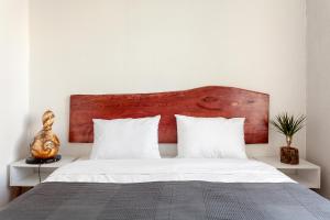 Postel nebo postele na pokoji v ubytování Origine rentals Z1