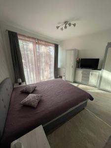 Posteľ alebo postele v izbe v ubytovaní Siófok VIP apartman