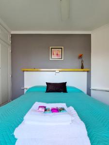 Postel nebo postele na pokoji v ubytování Departamento Nueva Córdoba RW + 35 fotografií