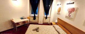 Posteľ alebo postele v izbe v ubytovaní Mandala Hostel