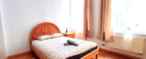 Posteľ alebo postele v izbe v ubytovaní Mandala Hostel