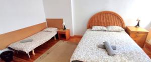 Posteľ alebo postele v izbe v ubytovaní Mandala Hostel