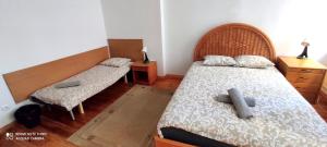 Posteľ alebo postele v izbe v ubytovaní Mandala Hostel