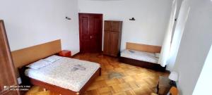 Posteľ alebo postele v izbe v ubytovaní Mandala Hostel