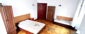 Posteľ alebo postele v izbe v ubytovaní Mandala Hostel