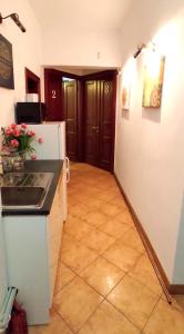 Kuchyňa alebo kuchynka v ubytovaní Mandala Hostel + 14 fotografií