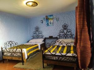 Katil atau katil-katil dalam bilik di Casa Rahma 1