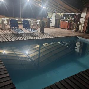 Bazén v ubytování Chalés Lumiar - Casas temporada nebo v jeho okolí