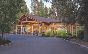 a large wooden house with a lot of windows at Seventh Mountain Resort in Bend