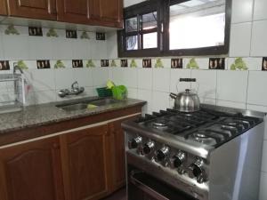 フェデラシオンにあるCASA AMAPOLA.のキッチン(コンロ、お茶ポット付) +9枚の写真