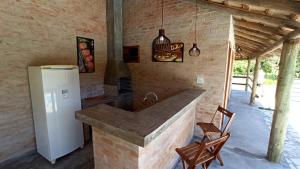 Η κουζίνα ή μικρή κουζίνα στο AIR Casa do Lago BNB OFF