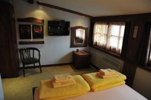 Voodi või voodid majutusasutuse B&B Galerija Two Rooms toas