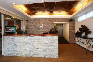 TV o dispositivi per l'intrattenimento presso Hotspring World Wulai