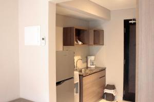 Cucina o angolo cottura di Mambruk Hotel & Convention