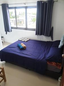 Letto o letti in una camera di P & T Hostel