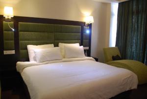 Postel nebo postele na pokoji v ubytování Hotel Oyster