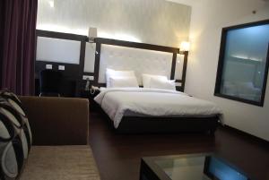 Postel nebo postele na pokoji v ubytování Hotel Oyster