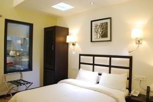 Postel nebo postele na pokoji v ubytování Hotel Oyster