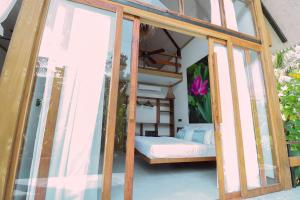 Letto o letti in una camera di Satya Boutique Resort & Spa