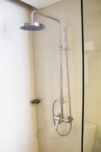Koupelna v ubytování Hariston Hotel & Suites, Pluit - Jakarta