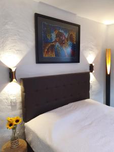 En eller flere senger på et rom på The first real Bed & Breakfast Hiking Hotel 'The Office' in Arequipa, Peru
