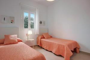 Postel nebo postele na pokoji v ubytování Villa Blanca + 17 fotografií