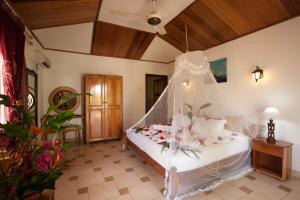 מיטה או מיטות בחדר ב-Etoile Labrine Guest House