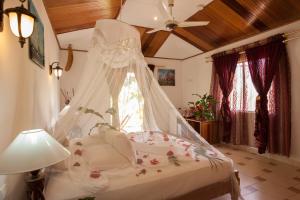 Postel nebo postele na pokoji v ubytování Etoile Labrine Guest House