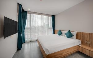 Postel nebo postele na pokoji v ubytování AMATA Residence