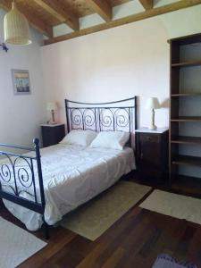 Кровать или кровати в номере Casa Vacanza Is Istrias