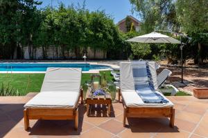 Foto dalla galleria di Gran Chalet céntrico con piscina y bbq privada a 5 minutos playa ad Alicante