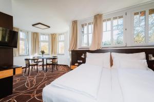 Posteľ alebo postele v izbe v ubytovaní Hotel Hubertus