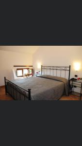 Postel nebo postele na pokoji v ubytování Hotel Dei Templi
