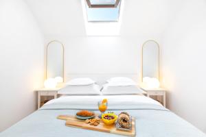 Postel nebo postele na pokoji v ubytování Apartman Luri