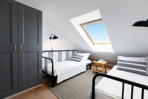 Postel nebo postele na pokoji v ubytování Apartman Luri