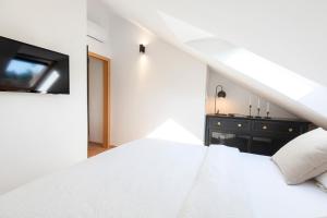Postel nebo postele na pokoji v ubytování Apartman Luri