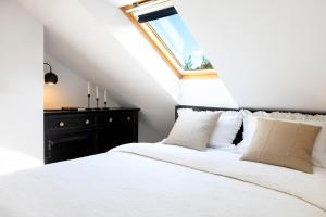 Postel nebo postele na pokoji v ubytování Apartman Luri