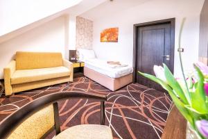 Posteľ alebo postele v izbe v ubytovaní Hotel Hubertus