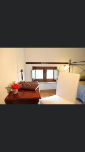 Postel nebo postele na pokoji v ubytování Hotel Dei Templi