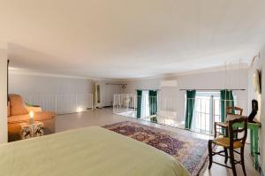 Posteľ alebo postele v izbe v ubytovaní JOIVY Superb Flat Near Christopher Columbus' House