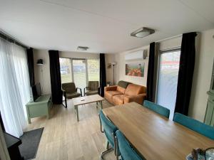 Posezení v ubytování Chalet de Huismus