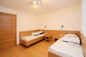 Katil atau katil-katil dalam bilik di Aurturist Badia