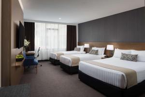 Postel nebo postele na pokoji v ubytování Rydges Camperdown