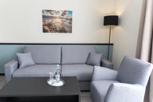 Ein Sitzbereich in der Unterkunft TIDE Hotel