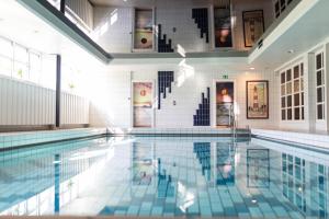 Der Swimmingpool an oder in der Nähe von TIDE Hotel