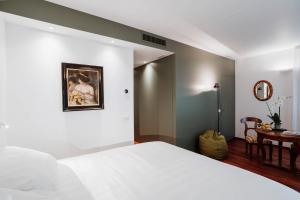 Giường trong phòng chung tại Bed and Breakfast Canalgrande